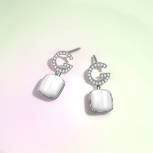 Mother of pearl drop earrings in 925 sterling silver with zircon and cat’s eye stone