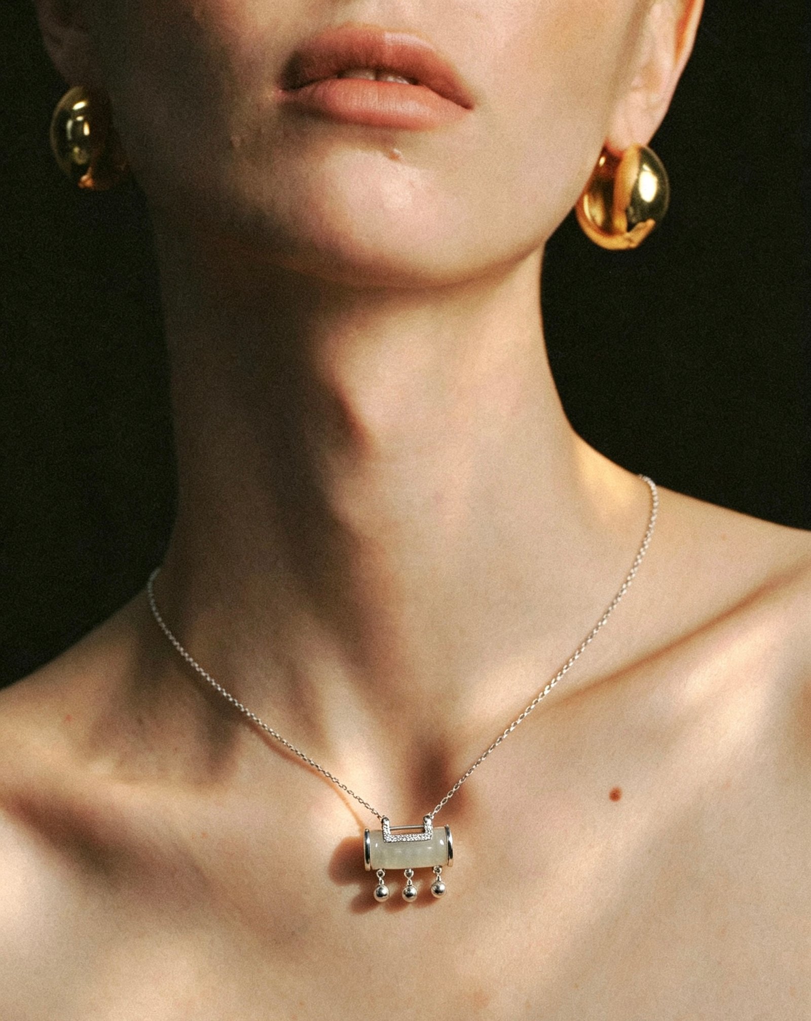 RONGHUA Peace Lock sterling silver necklace worn on the neckline