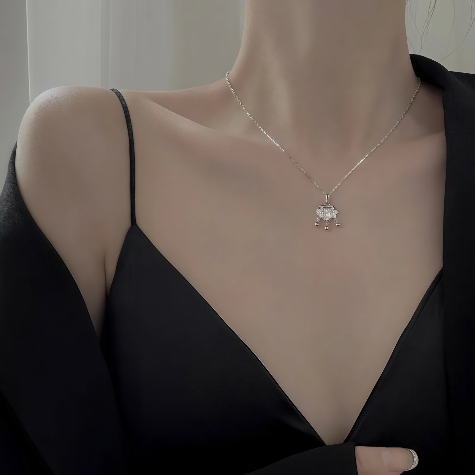 Ruyi Lock Necklace worn as a delicate silver necklace