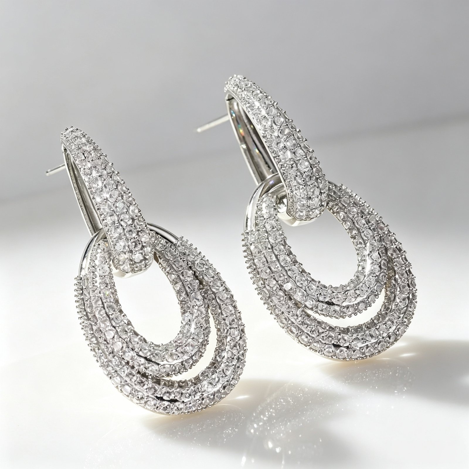 Silver Ripple Drop Pavé Earrings in 925 sterling silver with sparkling zircon