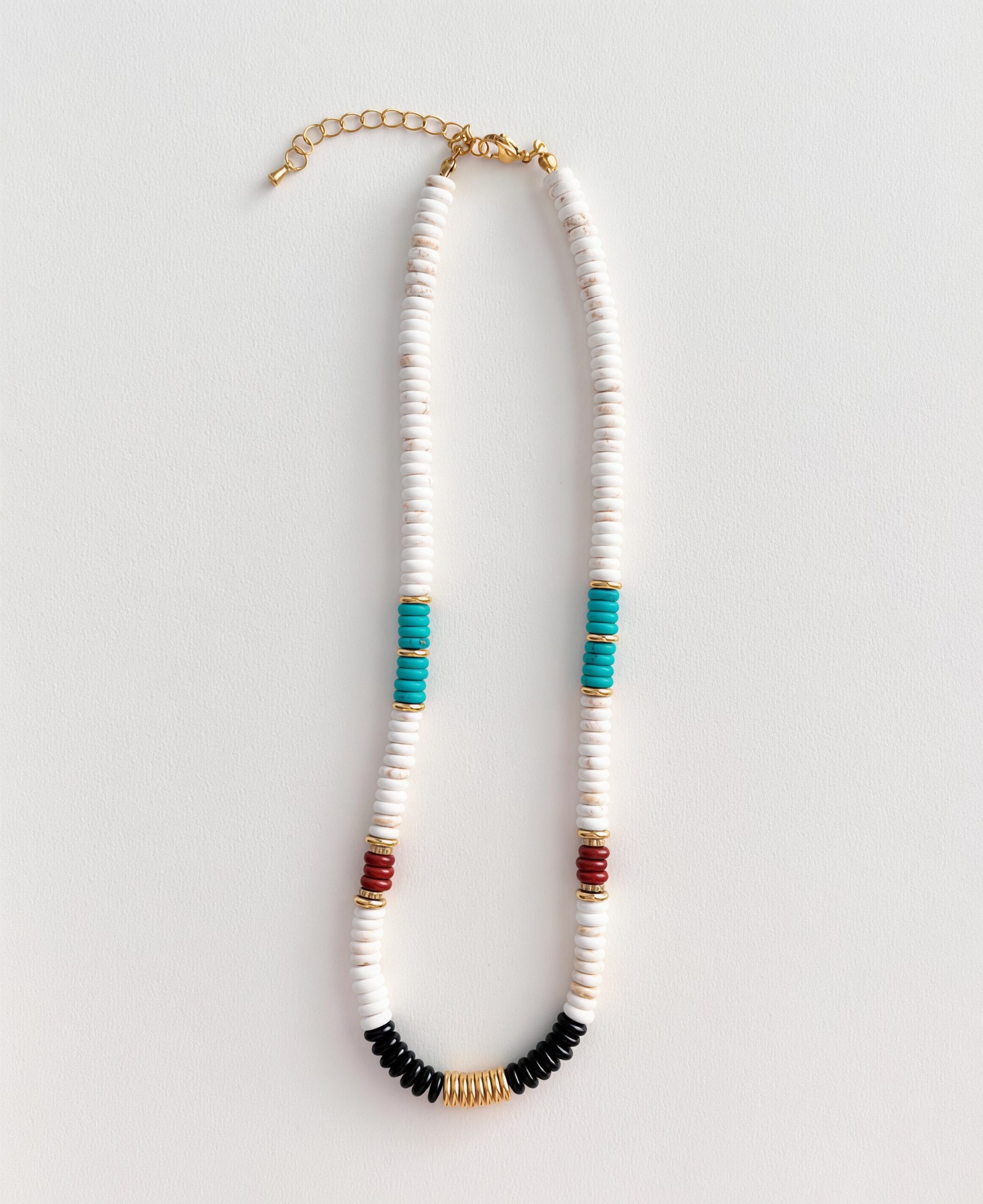 Close-up of turquoise and agate accents on a coastal bead necklace