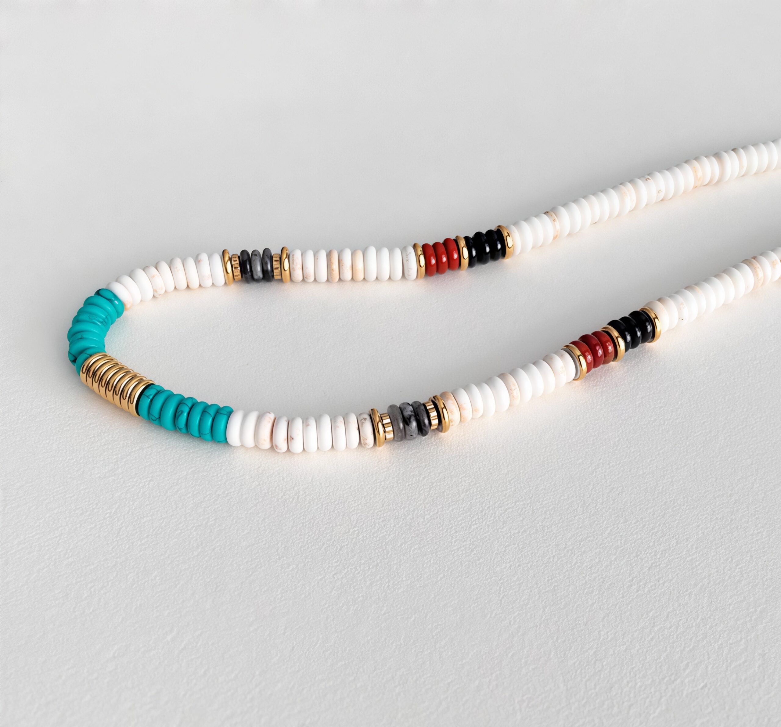 Close-up of turquoise and agate accents on a coastal bead necklace