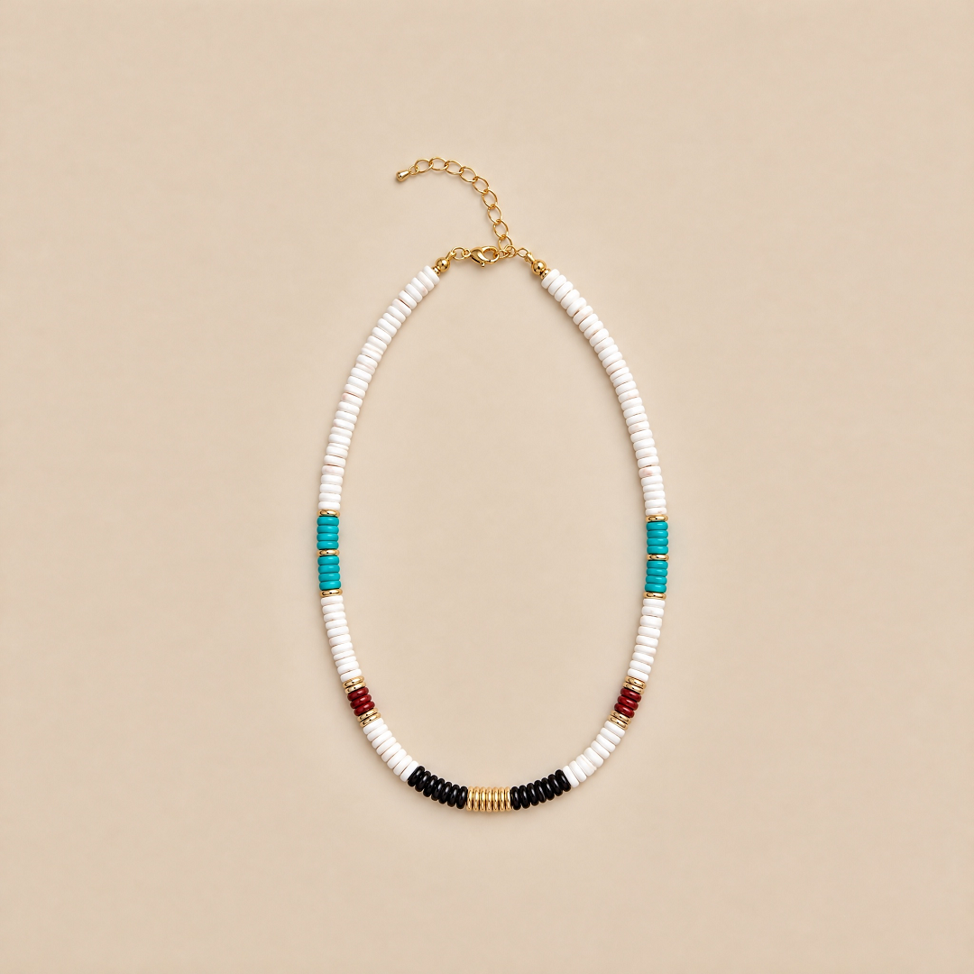 White mixed stone necklace with turquoise side accents and black center beads