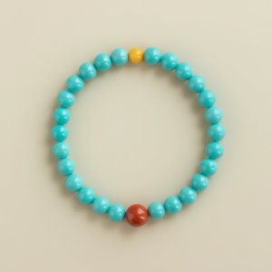 Turquoise bracelet with Nanhong agate and warm yellow jade accents