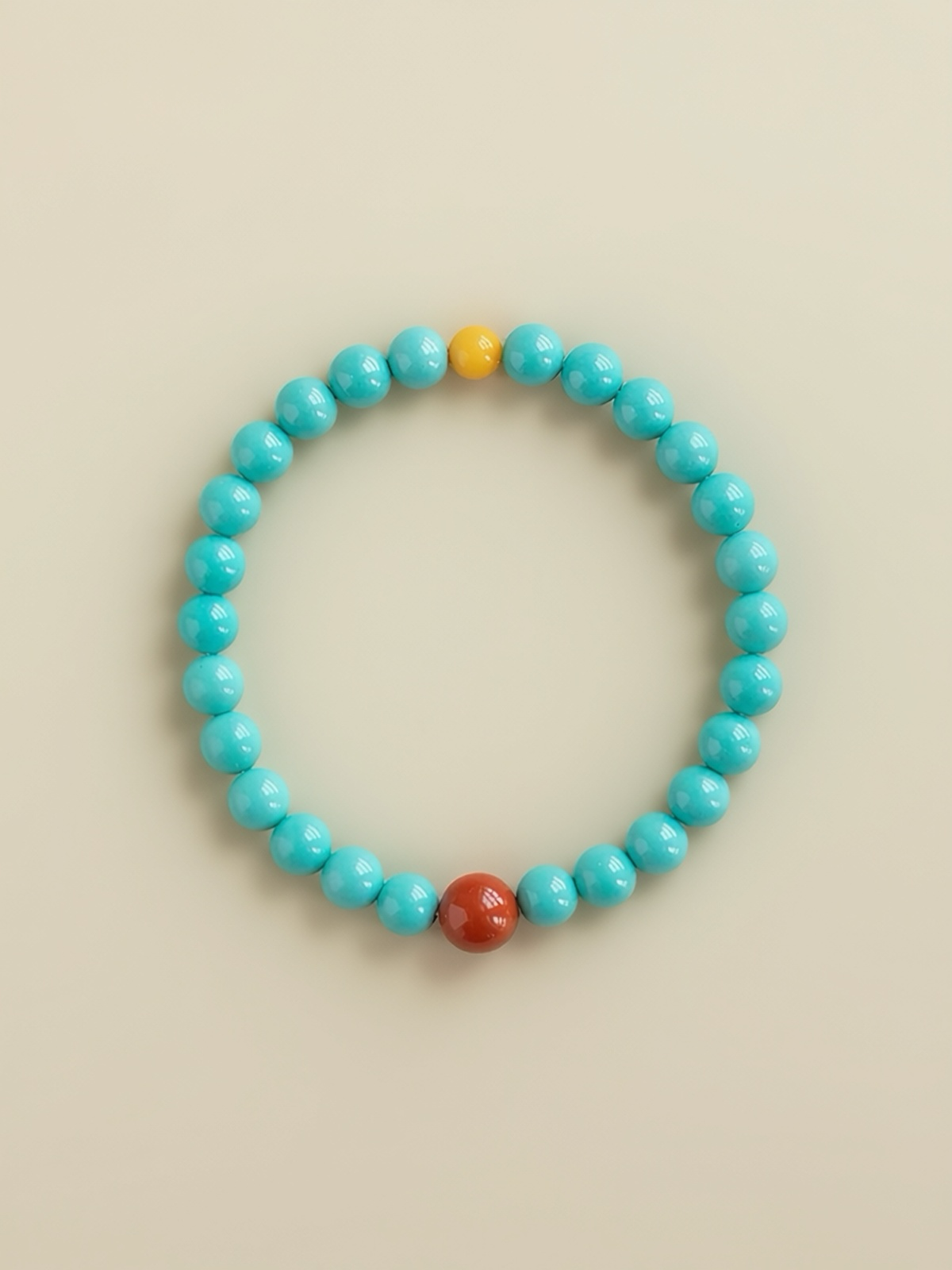 Turquoise bracelet with Nanhong agate and warm yellow jade accents