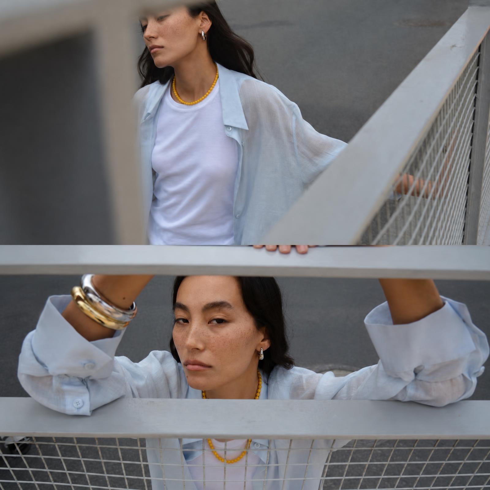 Woman wearing a natural beeswax amber bead necklace