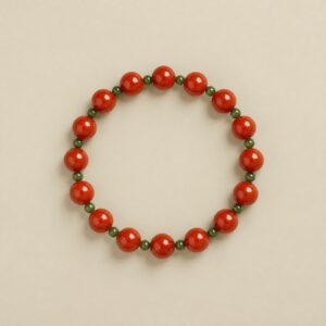 Meaningful Nanhong agate bracelet with small green jade beads