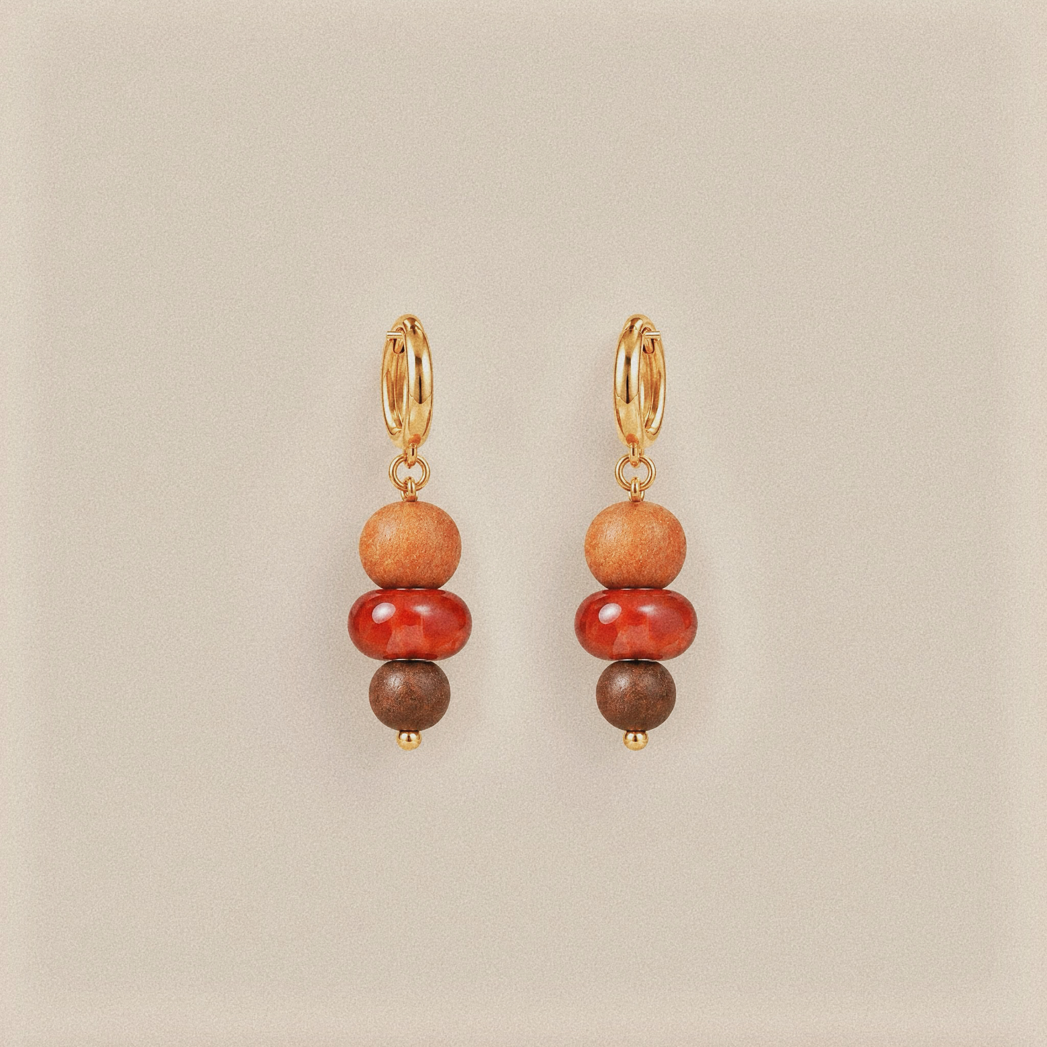 Striped agate and wooden bead earrings with gold-tone hoops