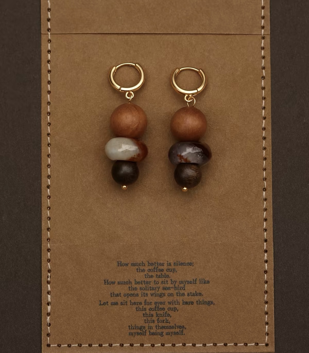 Agate and wood earrings photographed from two angles