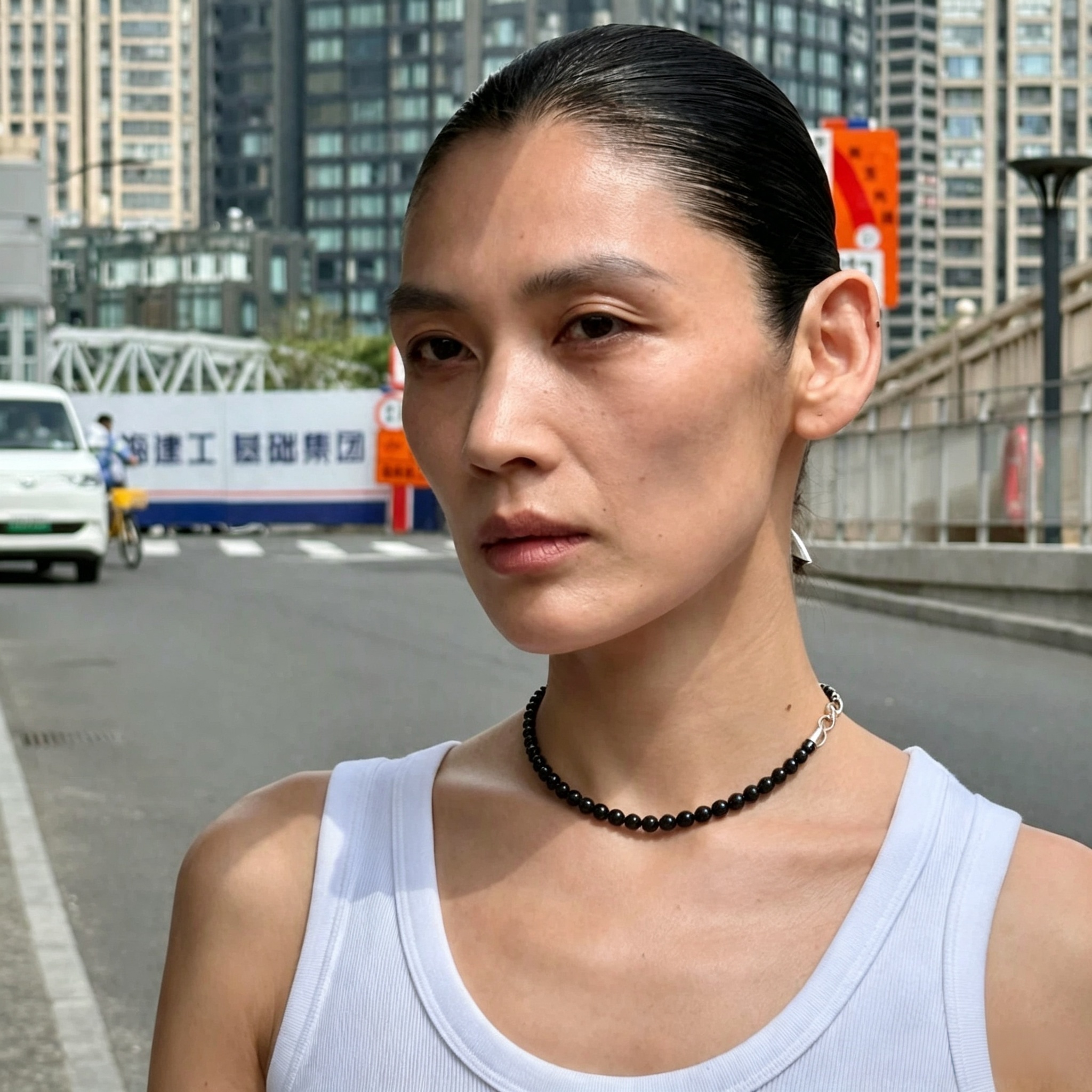 Model wearing Natural Black Agate Necklace 16 inch choker with white tank top
