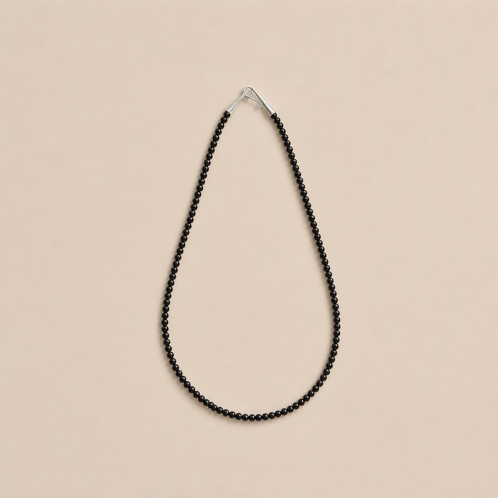Natural Black Agate Necklace 6mm strand flatlay with silver hook clasp